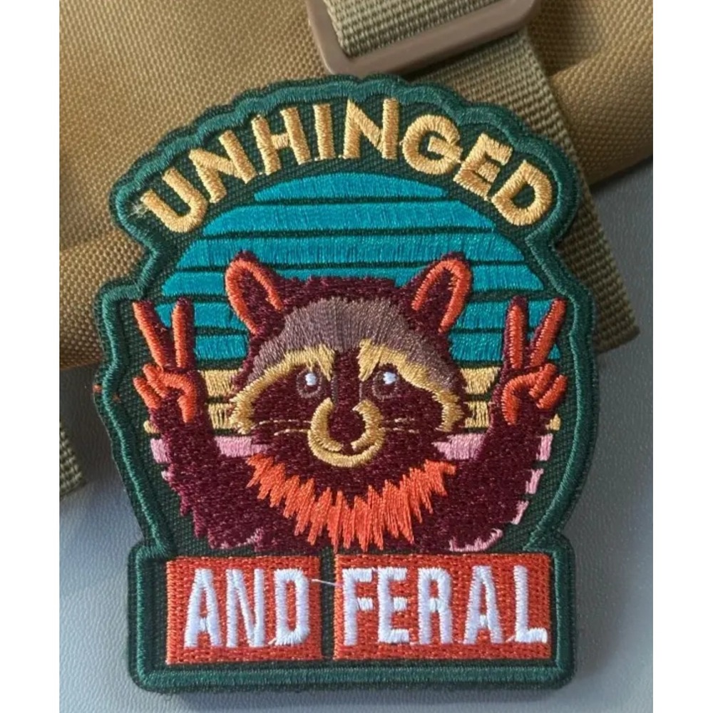 Unhinged and Feral Raccoon Embroidered Iron On Patch Retro Sunset Peace Signs